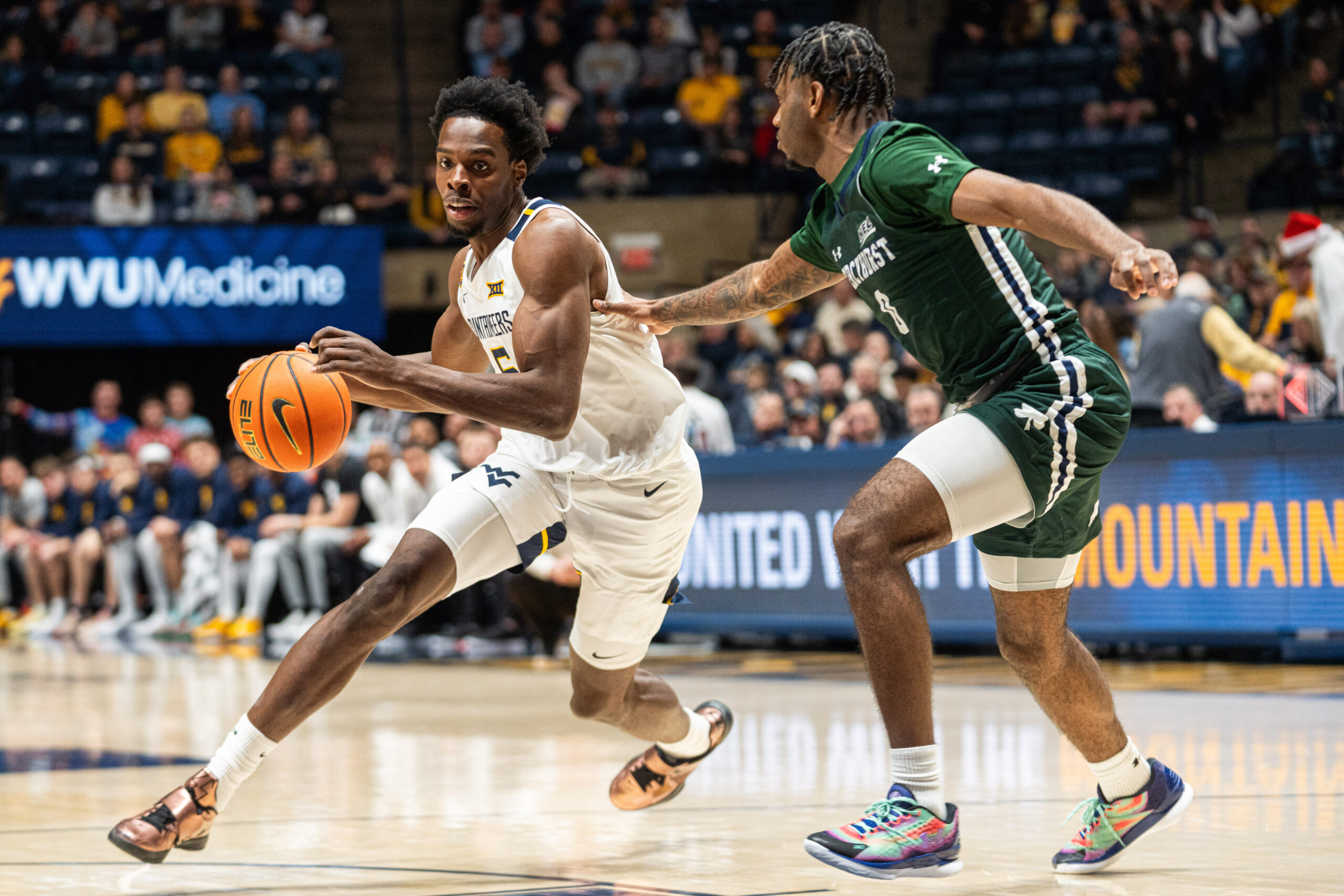 WVU gets defensive after Hansberry injury, beats Mercyhurst 67-46